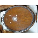 Late 19th/early 20th Century oval oak and silver plated two handled tray by Walker & Hall. (B.P.
