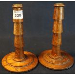 Pair of oak Art Deco design candle sticks on circular step bases. (B.P. 24% incl.