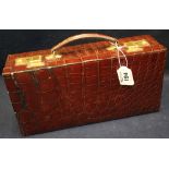 Good quality crocodile skin jewellery case with cantilever interior,