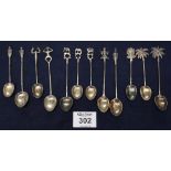 Two sets of Indian white metal coffee spoons with figural terminals, various. (B.P. 24% incl.