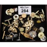 A collection of cufflinks and costume jewellery, including a Victorian bar brooch. (B.P. 24% incl.