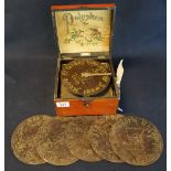 Late 19th/early 20th century mahogany cased polyphon with an assortment of music discs.