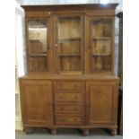 Early 20th Century oak two stage cabinet back bookcase on baluster turned supports. (B.P. 24% incl.