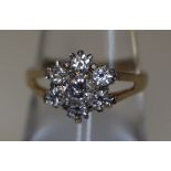 A 9ct gold cluster ring. (B.P. 24% incl.