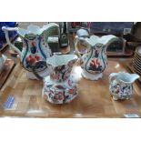 Three 19th Century Imari design Gaudy Welsh dresser jugs,