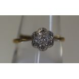 An 18ct gold Art Deco diamond cluster ring. Weight 2.2g approx. (B.P. 24% incl.