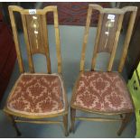 Pair of Edwardian mahogany bedroom chairs with Art Nouveau design on floral seats. (2) (B.P.