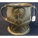 Early 20th Century Art Nouveau design bronzed repousse decorated two handled planter with stylised