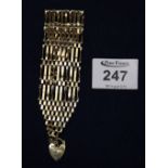 A ten bar 9ct gold gate bracelet, approx weight 19g. (B.P. 24% incl.