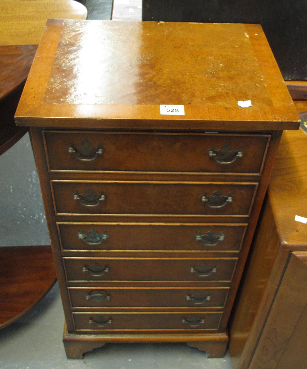 Reproduction yew wood narrow straight front chest of six drawers on bracket feet. (B.P. 24% incl.