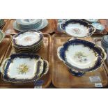 Two trays of early 20th Century Coalport bone china items overall with cobalt blue and gilded