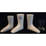 Three ceramic boots together with a glass moulded boot, possibly for display. (B.P. 24% incl.