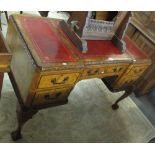 Early 20th Century walnut knee hole desk having two drawers to each pedestal,