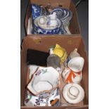 Two boxes of assorted china to include; blue and white bowls and plates,