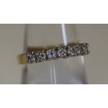 An 18ct gold half eternity style ring set with diamonds. Weight 3.6g approx. (B.P. 24% incl.