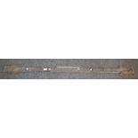 Long wooden spirit level with metal end mounts and brass gauge. (B.P. 24% incl.