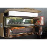 Box containing mainline railways authentic 00 gauge model and Lima locomotives and carriages in