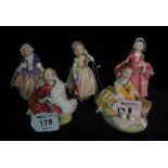 Five Royal Doulton bone china figurines to include; 'Picnic' HN2308, 'Home again' HN2167,