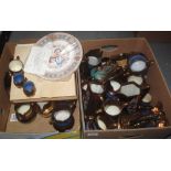 Two boxes of assorted copper lustre dresser jugs,