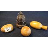 Small collection of treen sewing accessories to include: three wooden darning eggs;