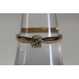 An 18ct gold and diamond solitaire ring. Weight 2.2g approx. (B.P. 24% incl.