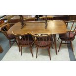 Elm rectangular Ercol dining table on square tapering legs,