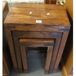 Nest of three hardwood rectangular pull out tables with metal mounts (probably Mexican pine). (B.P.