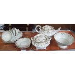 Two trays of Masons patent ironstone china teaware on a white ground with gilt foliate decoration.