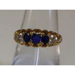 An 18ct gold Victorian ring set with sapphires and diamonds. Weight 3.7g approx. (B.P. 24% incl.