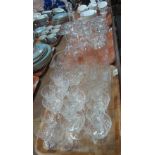 Trays of assorted glassware, mainly drinking vessels, cut glass tumblers, liqueur glasses,