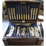 Early 20th Century oak canteen of silver plated cutlery with pull out drawer revealing further
