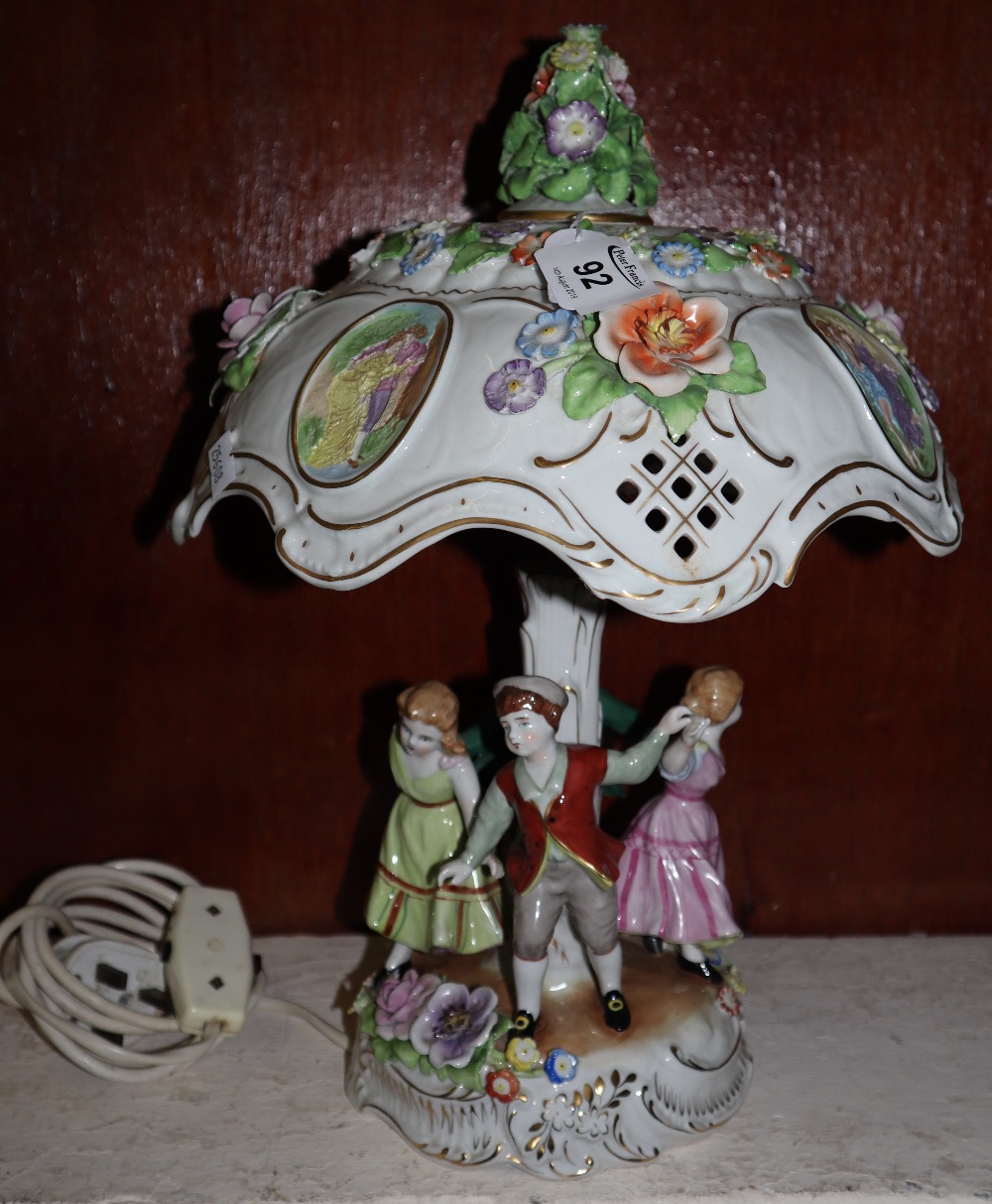 German porcelain figure mounted merry go round table lamp. Printed marks. (B.P. 24% incl.