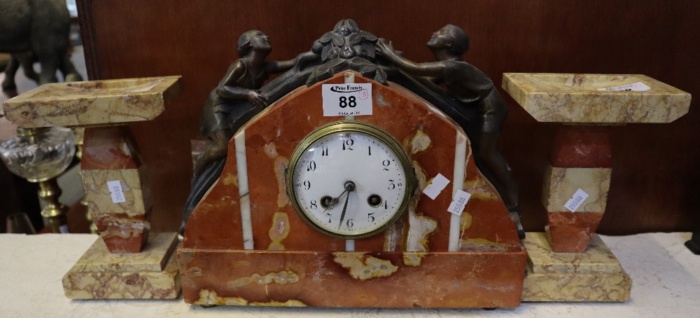 Art Deco design rouge marble two train clock garniture,