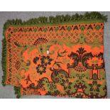 Red and green woven rug with floral and bird design. (B.P. 24% incl.