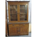 Early 20th Century scrumbled pine two stage cabinet back bookcase on stile feet. (B.P. 24% incl.