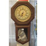 Early 20th Century American single train octagonal wall clock. (B.P. 24% incl.