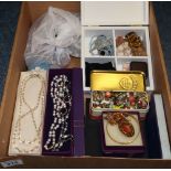 Box of assorted costume jewellery items, many in original boxes, together with a bag of same. (B.P.