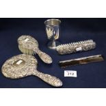 Silver backed dressing table set to include; mirror, two brushes and a comb,