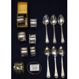 Assorted napkin rings, various and a set of six pierced and bright cut silver coffee spoons. (B.P.