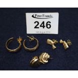 Two pairs of 9ct gold earrings and a pair of yellow metal earrings. Approx total weight 7.5g. (B.P.