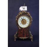 Small French balloon shaped yellow metal mounted tortoiseshell inlaid mantel clock with French