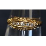 An 18ct gold and diamond five stone ring, 2.6g approx. (B.P. 24% incl.