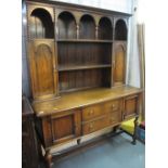 Early 20th Century oak two stage rack back dresser. (B.P. 24% incl.