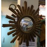 20th Century gilded sunburst mirror with convex plate. (B.P. 24% incl.