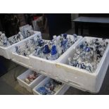 Four boxes of blue and white continental figurines, oriental style figurines etc. (4) (B.P.