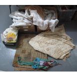 Two boxes of vintage fabrics to include; crochet tablecloths, embroidered,