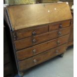 19th Century Welsh oak fall front bureau having two short and three long drawers on turned supports.