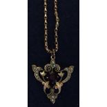 A 9ct gold Art Nouveau amethyst and seed pearl pendant on a 9ct gold chain. 10.3g approx in total.