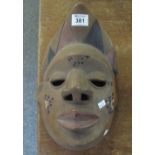 20th Century carved hardwood tribal mask. (B.P. 24% incl.