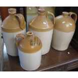 Four vintage stoneware two tone flagons, one marked 'The Swansea old brewery (Davies, Cardigan)',
